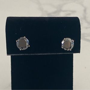4 cttw with each black Diamond 2 cts in 14 kt white gold
